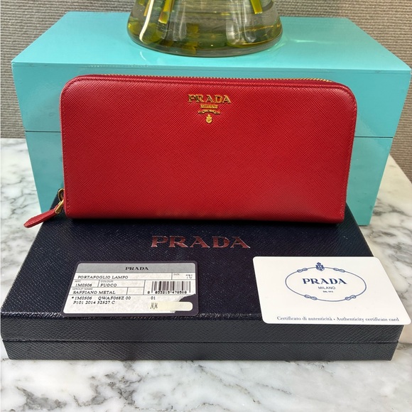 Prada Handbags - Prada Fuoco Dark Red Saffiano Leather Zip Around Wallet - NWT Authentic